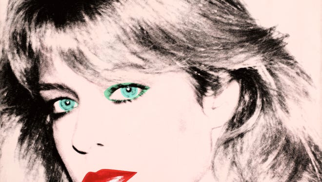 This photo released by courtesy of the Blanton Museum of Art shows Andy Warhol's painting of 'Farrah Fawcett,' 1980.