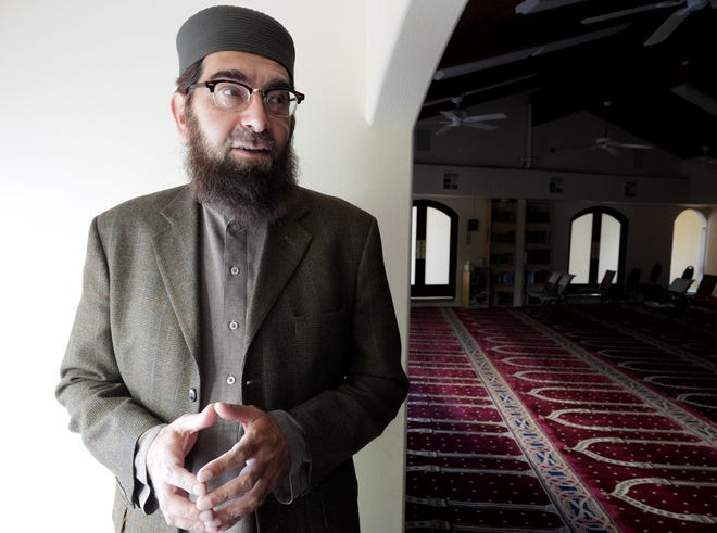 Imam Muhammed Mehtar stands inside the Islamic Center of Conejo Valley in Newbury Park.