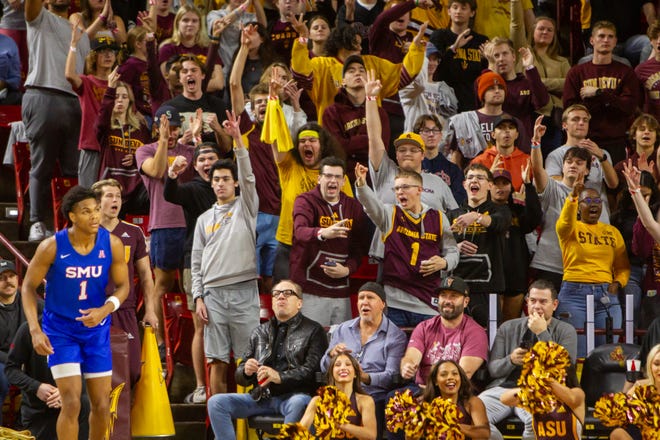 ASU fans celebrate a 3-pointer at Desert Financial Arena in Tempe on Dec. 6, 2023.