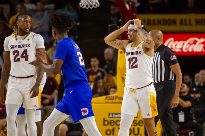 Jose Perez (12) reacts to a foul called at Desert Financial Arena in Tempe on Dec. 6, 2023.