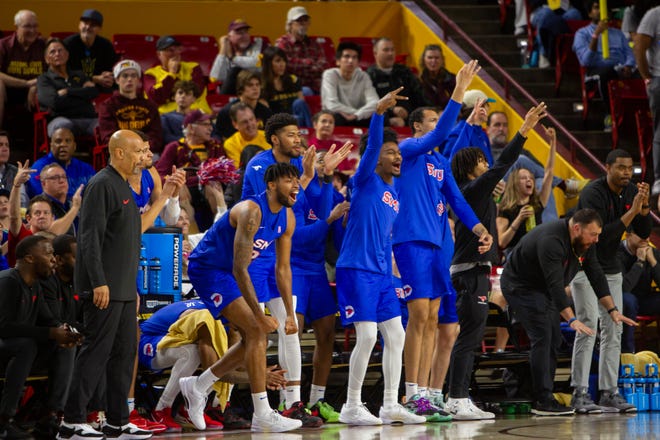 SMU sideline reacts to a 3-pointer at Desert Financial Arena against ASU in Tempe on Dec. 6, 2023.