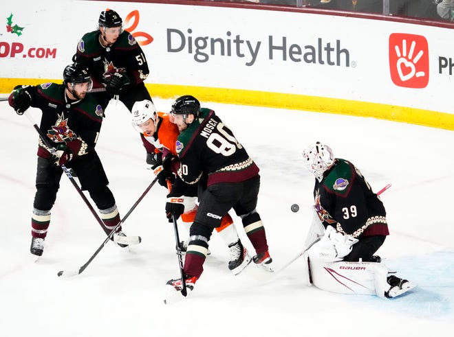 Arizona Coyotes goaltender Connor Ingram (39) makes a save against the Philadelphia Flyers in the second period at Mullett Arena.